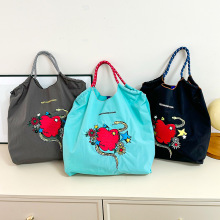 2025春季新款日系尼龙刺绣包包时尚百搭小众大容量单肩购物袋女潮