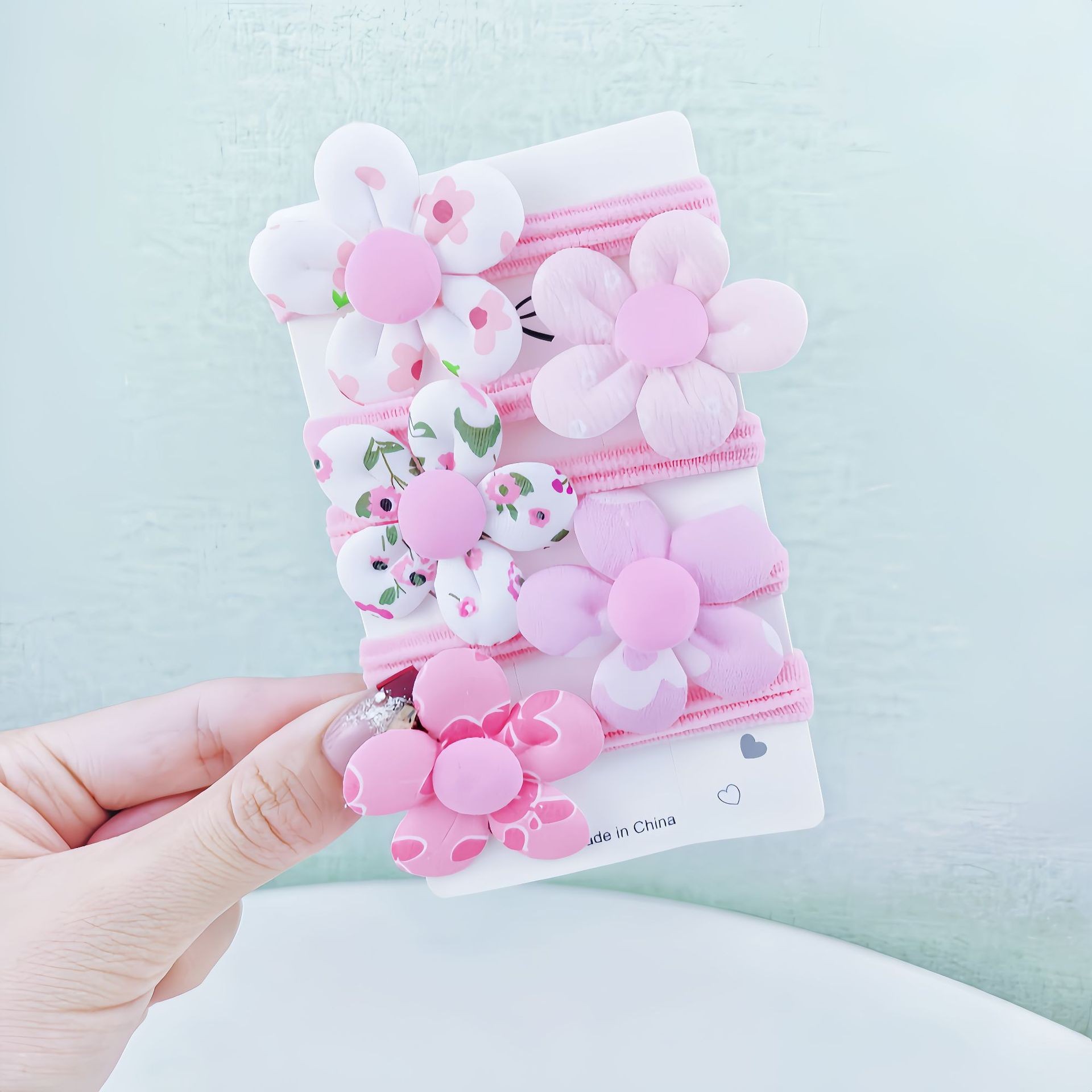 5 piezas de flores rosadas