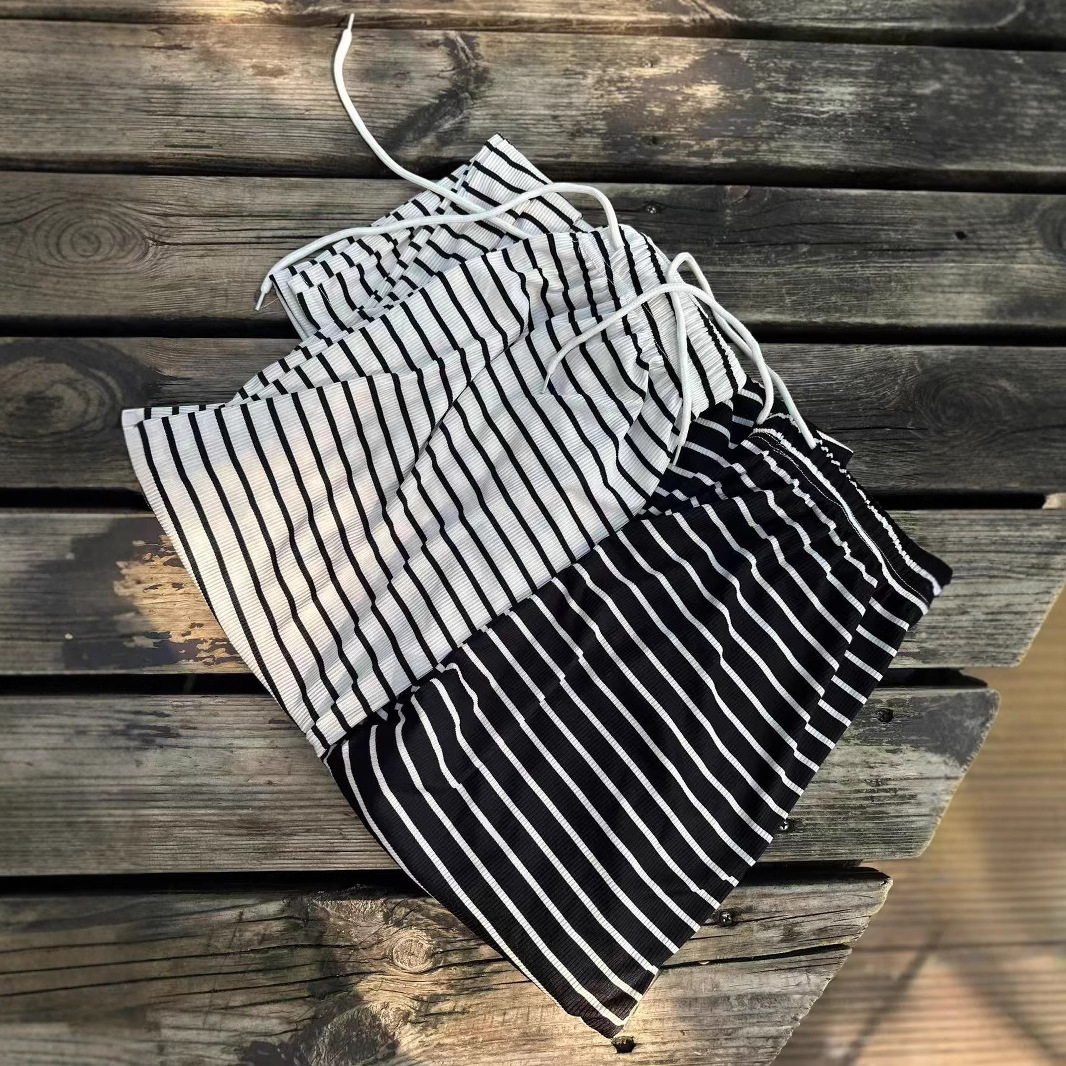 Pantalones anchos a rayas en blanco y negro para mujer, nuevos pantalones de caída de seda de hielo de todo fósforo de cintura alta, pantalones casuales de trapeador con cordón suelto delgado