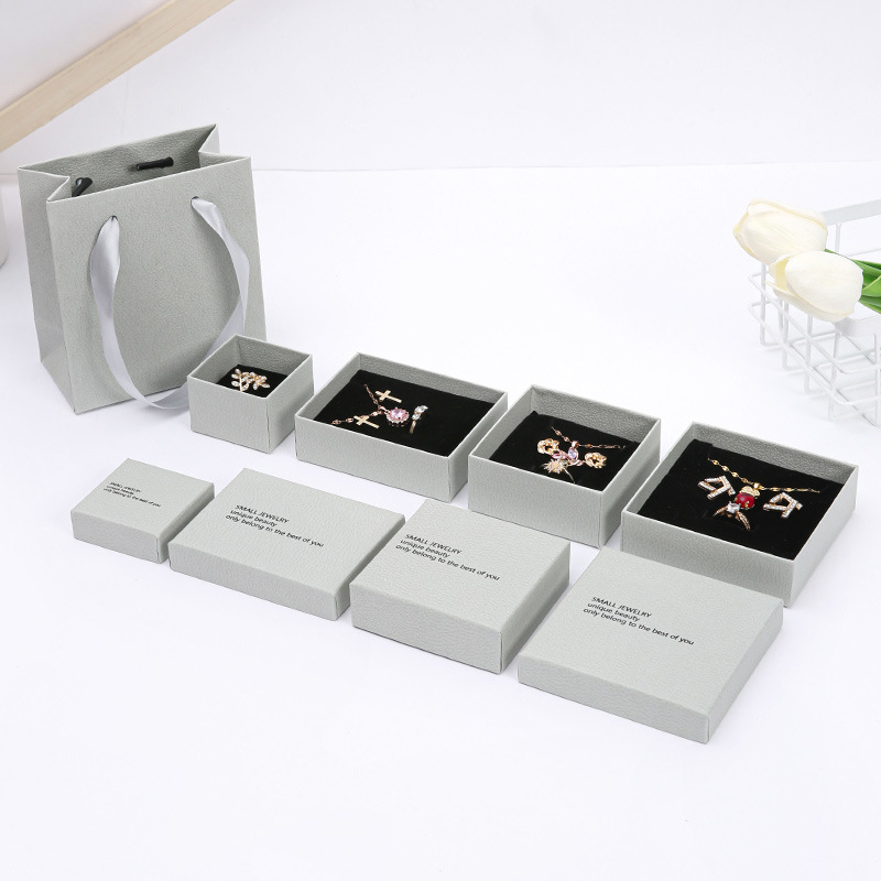 Caja de cubierta de papel duro en el lugar Collar pendientes anillo joyas Caja de embalaje de joyas Caja de joyas de alta calidad