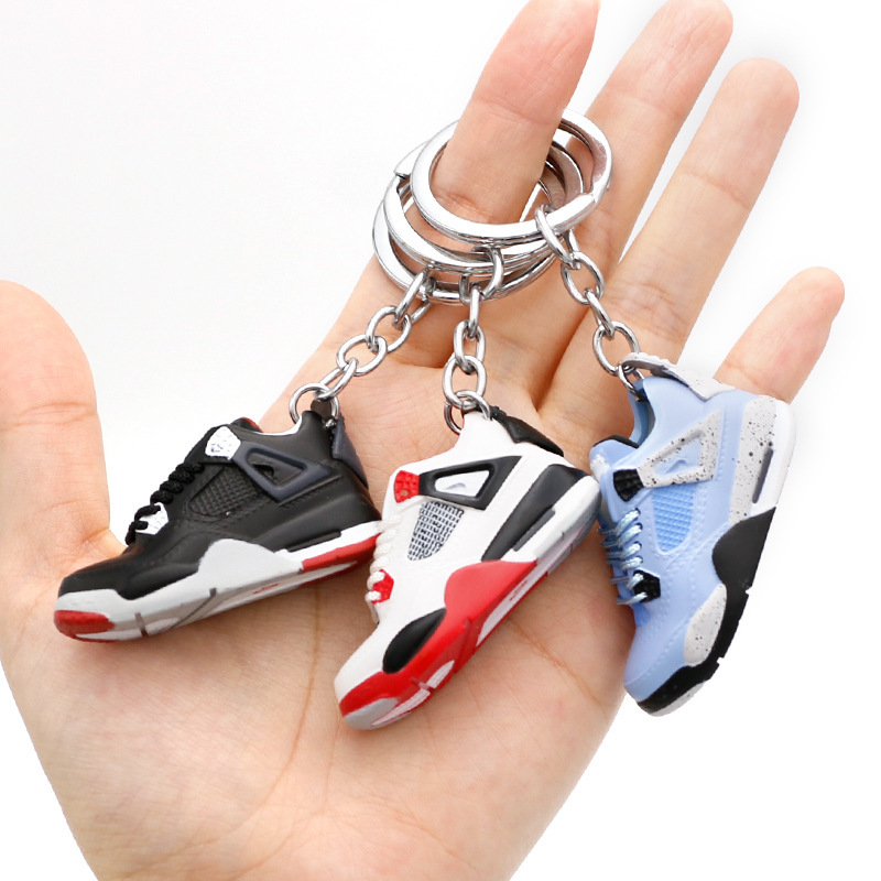 aj4 white cement University Blue key chain 3D three-dimensional sneakers pendant four-generation model creative ins fashion ornaments aj4 white cement University Blue key chain 3D three-dimensional sneakers pendant four-generation model creative ins fashion ornaments