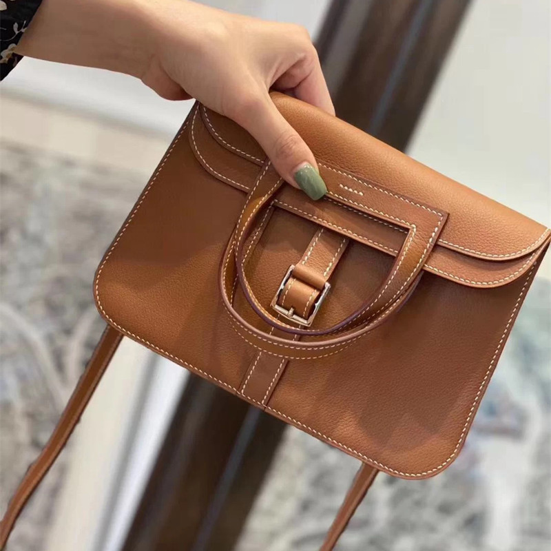 Venta directa de la fábrica 2024 nuevo maletín de cuero de vaca con patrón de litchi en la primera capa de primavera y verano, bolso de mujer con cuero de vaca en un hombro