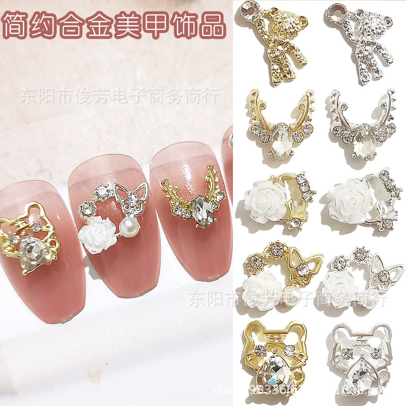 New Camellia butterfly Garland alloy nail jewelry pearl diamond-embedded bear heart-hugging Tiger deer nail sticker New Camellia butterfly Garland alloy nail jewelry pearl diamond-embedded bear heart-hugging Tiger deer nail sticker