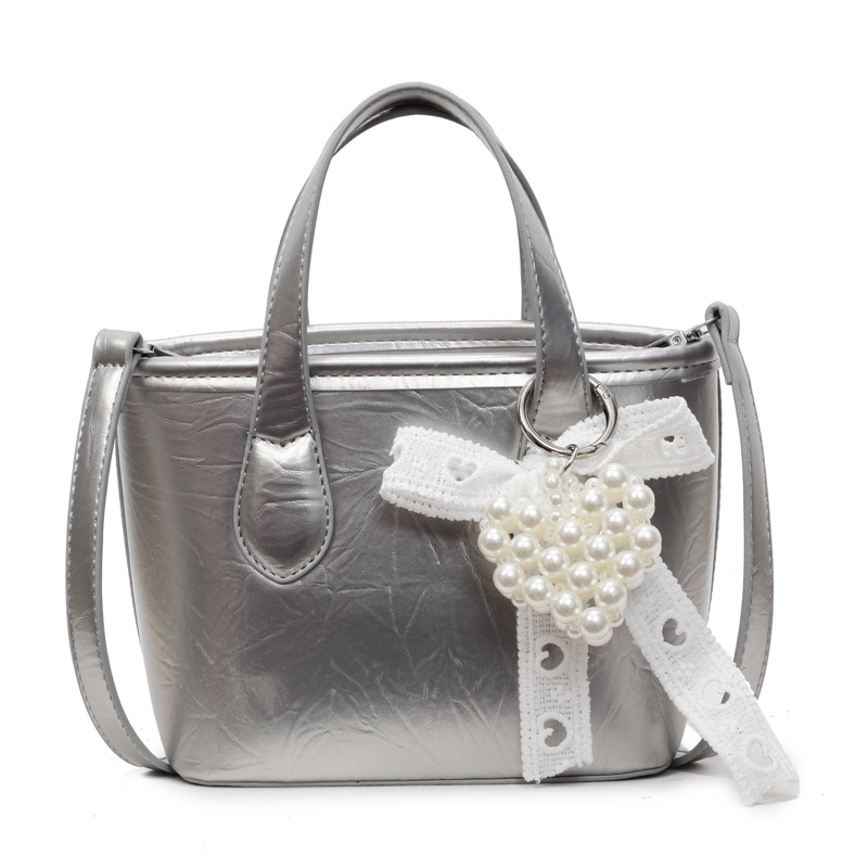 Bolso Tote popular de este año 2025 verano nuevo bolso bolso de hombro con patrón de agarre lindo bolso de mensajero de todo fósforo mujer