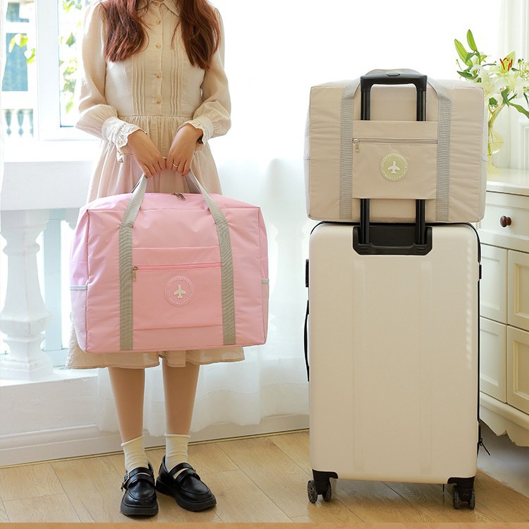 Solid color fresh folding suitcase for traveling for moving