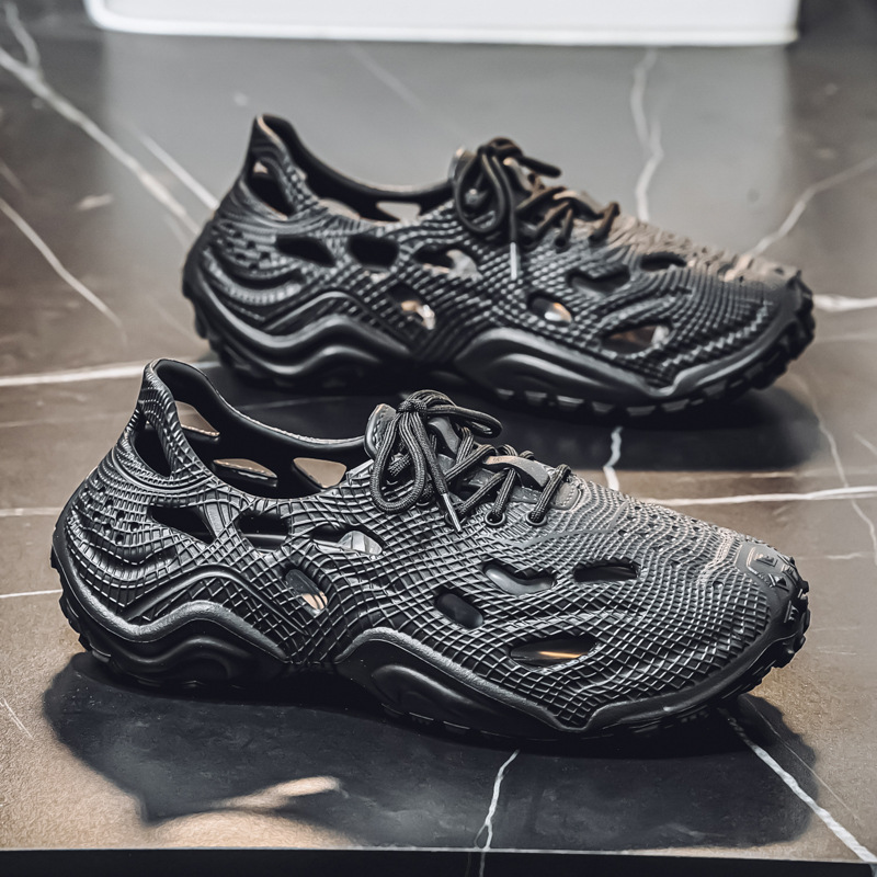 Comercio exterior transfronterizo zapatos con agujeros para hombres 2025 nueva playa moda de verano sandalias zapatillas zapatos de cabeza al por mayor