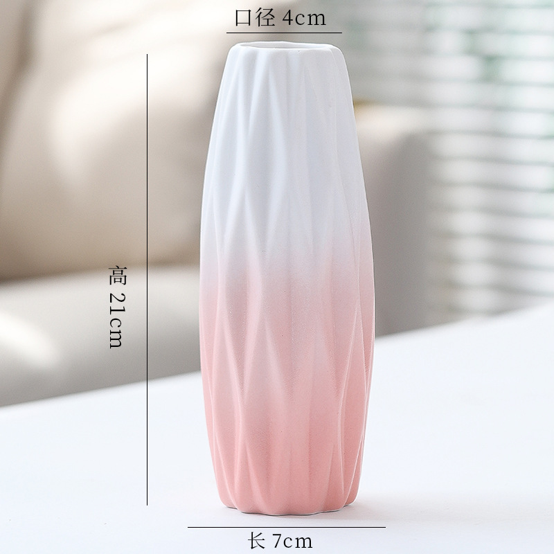 シンプルな現代の満天星陶磁器の花瓶の置物の客間の白い磁器の小さい清新な乾いた花の生け花の創意の陶磁器の花器|undefined