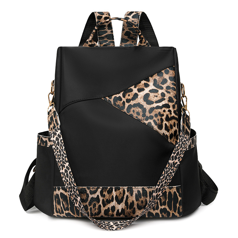 Nueva mochila con estampado de leopardo para mujer 2024 nueva mochila de viaje de todo fósforo de moda de gran capacidad mochila escolar para estudiantes de un solo hombro
