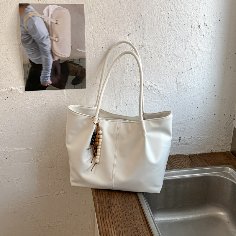 Bolso 2026 nuevo retro bolso de hombro de transporte de gran capacidad bolso de mujer simple y versátil bolso de brazo portátil
