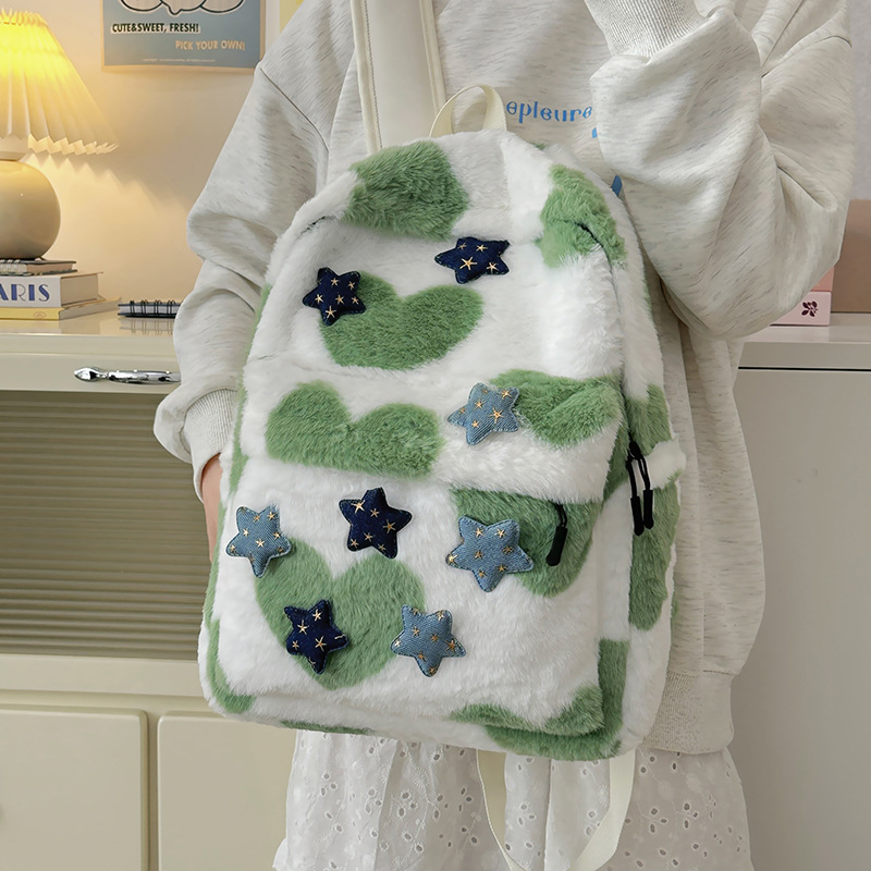 La versión coreana de la mochila de peluche es una mochila de doble hombro, el diseño de nicho japonés de la mochila de alto valor facial, la mochila de clase de las estudiantes universitarias.