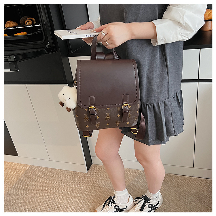 This is a niche design for women, featuring cartoon animal prints. It is a pink backpack with a high level of appearance and large capacity for travel undefined