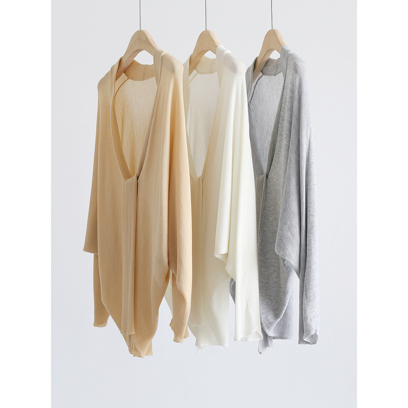 Spring and Summer Lazy and Casual Cocoon-Style Tie-Up Batwing Long-Sleeve Loose Knit Cardigan Paired with a Solid Color Tencel Top Shawl Spring and Summer Lazy and Casual Cocoon-Style Tie-Up Batwing Long-Sleeve Loose Knit Cardigan Paired with a Solid Color Tencel Top Shawl
