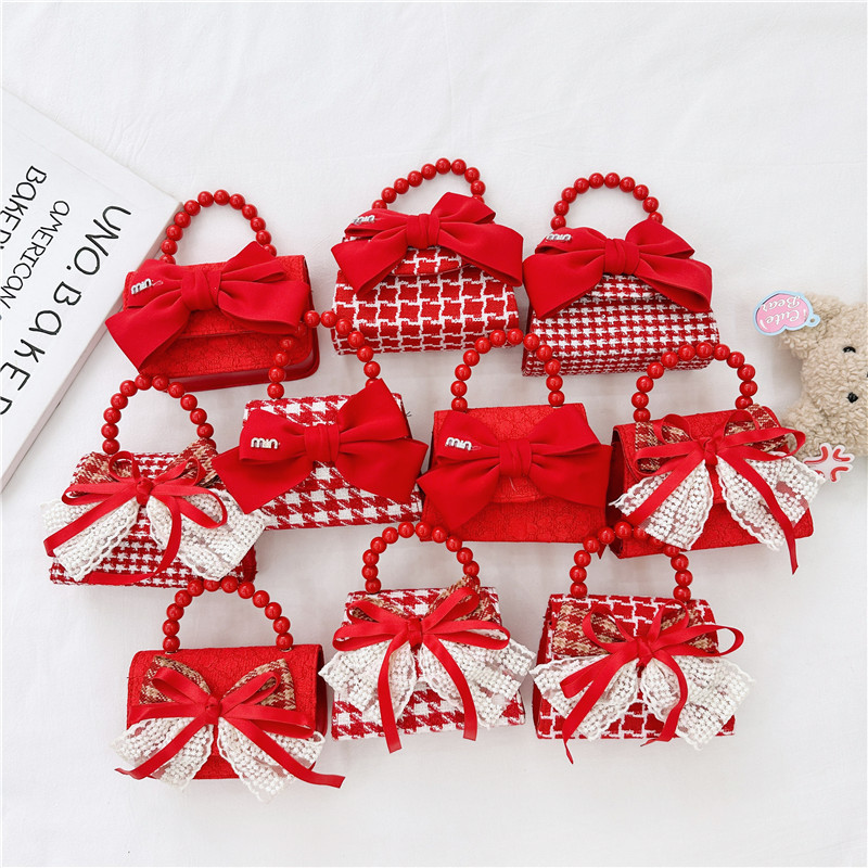 Año nuevo rojo Chanel estilo de los niños perla bolso del bebé lindo arco cadena niñas monedero