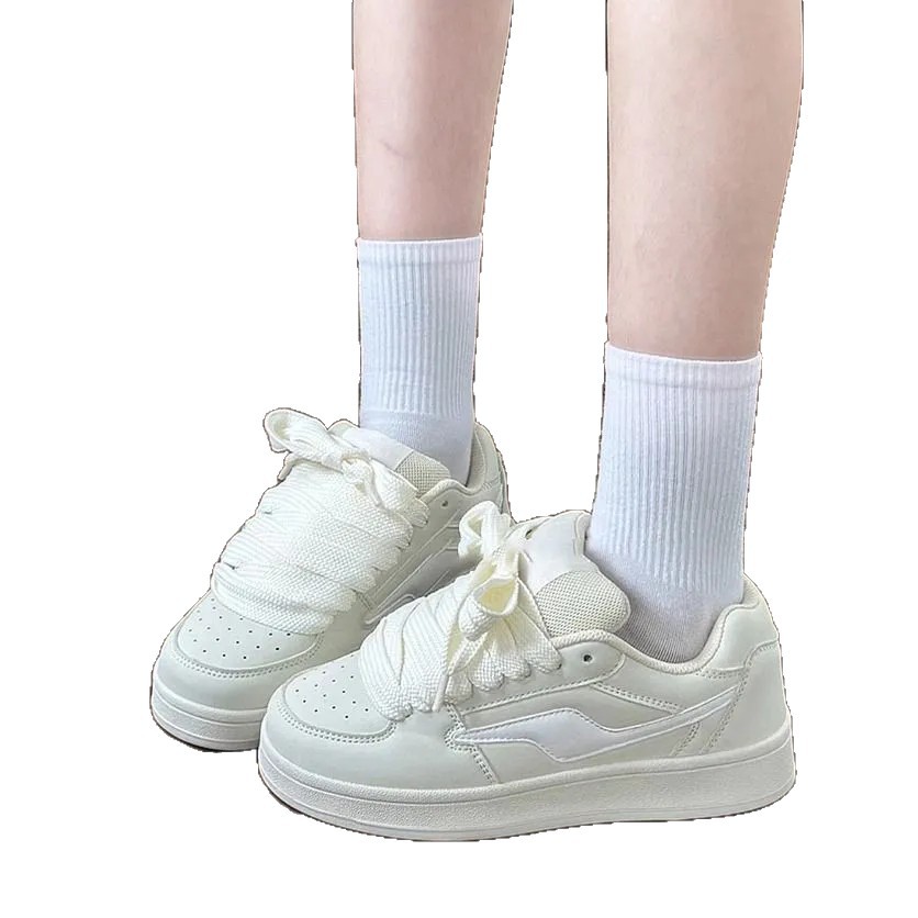 Diseño coreano de nicho de zapatos de pan de suela gruesa para mujeres INS2025 nuevos zapatos de skate casuales de cuero suave