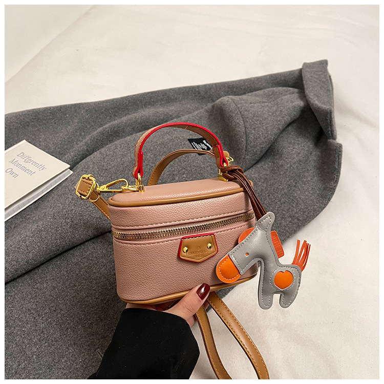 Bolsos para niños al por mayor 2025 nueva versión coreana Harajuku estilo de alta gama patrón de lichi bolso diagonal retro bolso pequeño para niñas