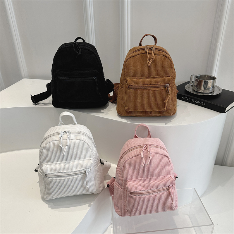 2025 nueva mochila casual japonesa tendencia universal mochila de moda simple nicho bolso portátil ligero
