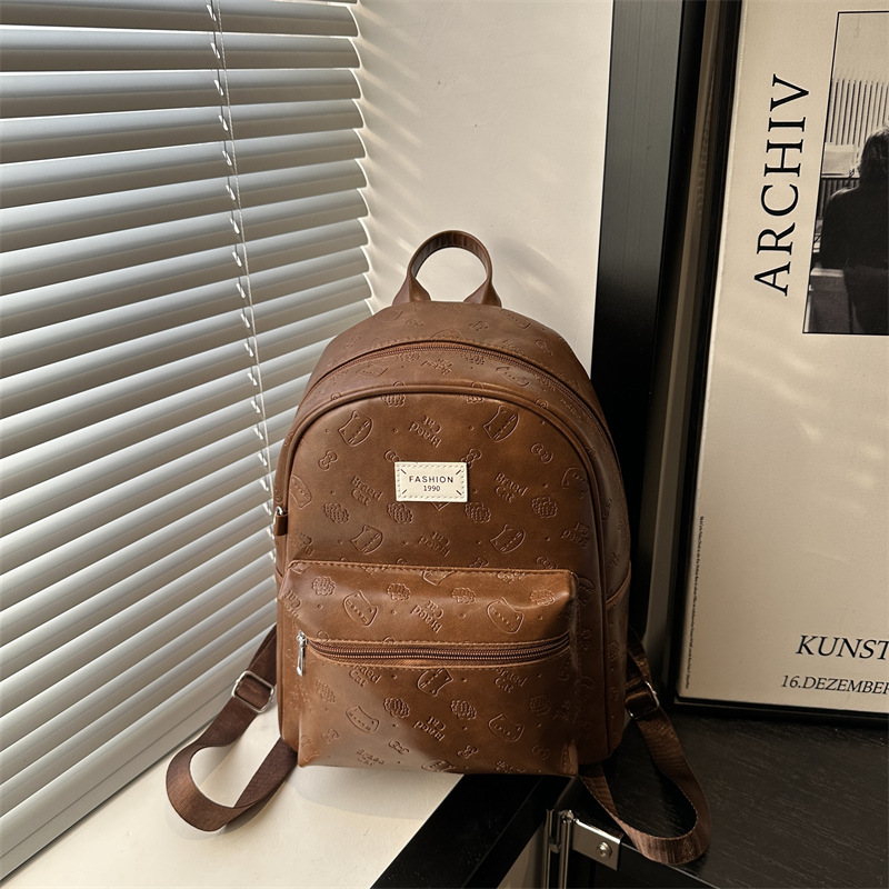 Mochila de nicho coreano para mujeres 2025 nueva moda retro ocio versátil mochila de viaje de estudiantes