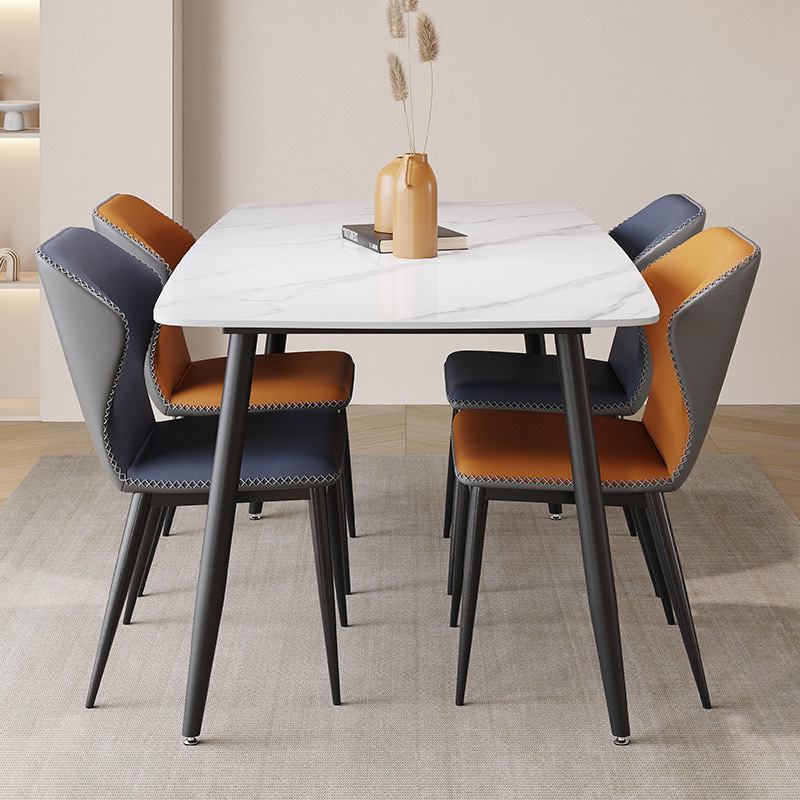 Mesa y silla de comedor de tabla de roca ligera de estilo italiano de lujo, combinación de mesa y silla de comedor de apartamento rectangular moderno y simple.