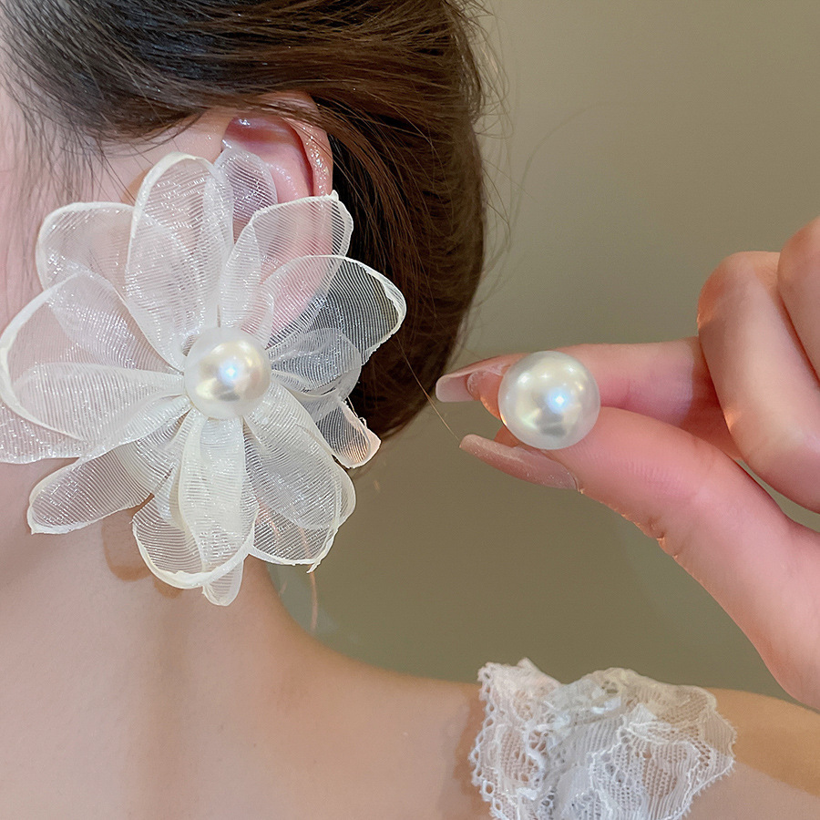 Pendientes de flor de lazo elegante de súper hada de plata Pendientes de moda de lujo ligero francés Pendientes de todo fósforo dulce de estilo literario