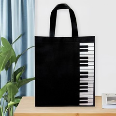 ピアノ楽譜バッグアート音楽不織布ハンドバッグ学生指導および研修機関ギフトバッグ送料無料