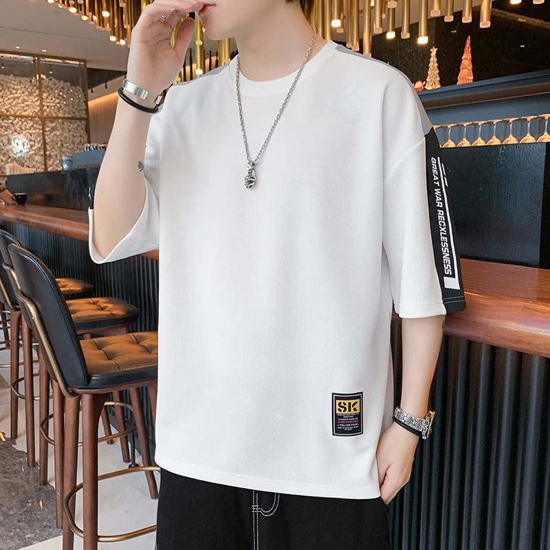 Camiseta de manga corta para hombres de verano de cinco puntos de manga de Hong Kong estilo de deporte transpirable media manga juvenil camiseta suelta universal