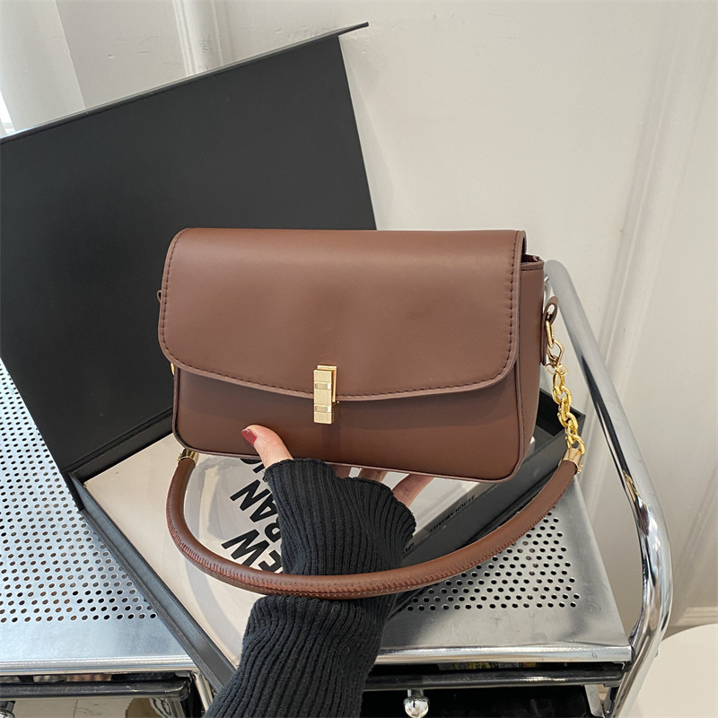 2025 primavera y verano nuevo estilo extranjero bolso axilar otoño y invierno minimalista bolso de hombro de diseño nicho bolso de textura