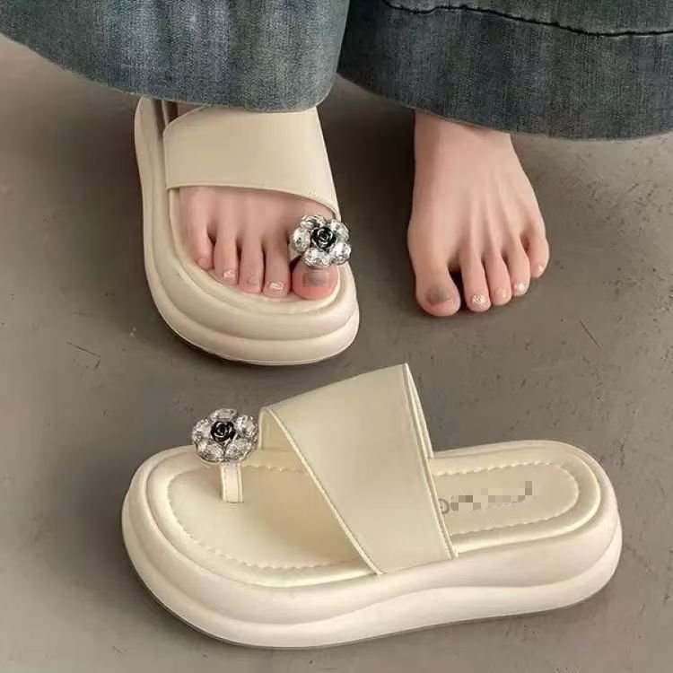 2026 verano nuevo estilo simple de moda de vacaciones de hadas sandalias de playa de viento de dedos de los dedos para usar zapatillas frías para mujeres