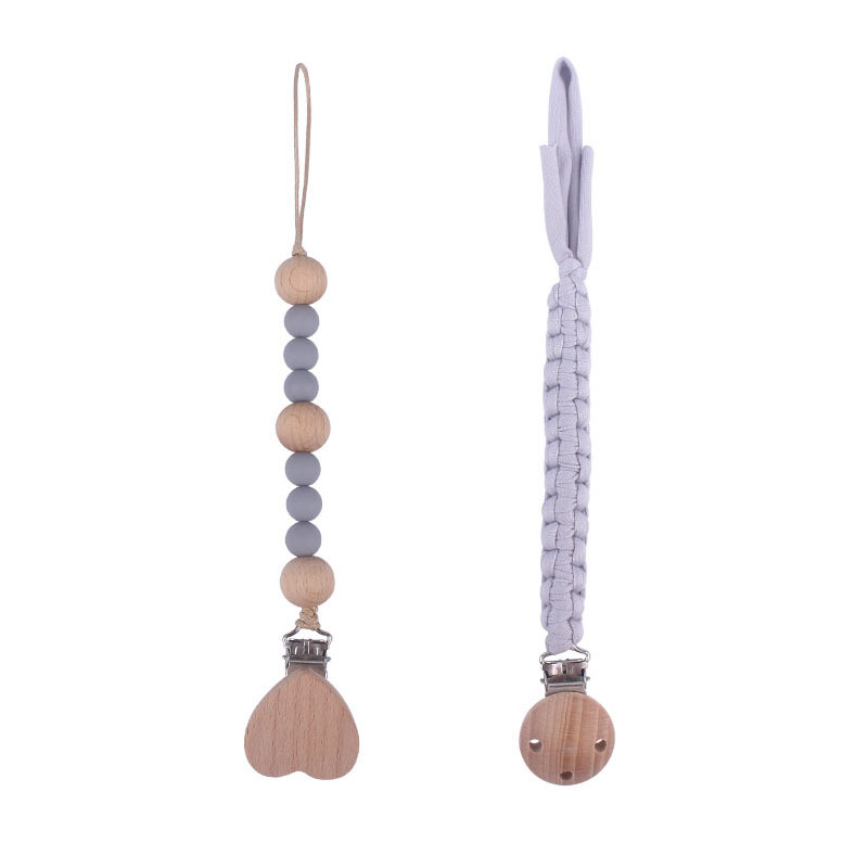 Nuevos suministros para bebés Beech Love Clip calmante bebé tela de algodón anti-gota Cadena de silicona perlas pezón cadena traje