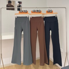 021905春の新しい女性のラッパのズボンの超高腰の裸感のズボンのヨガは痩せています。