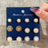 Retro earrings from pearl, golden set, flowered