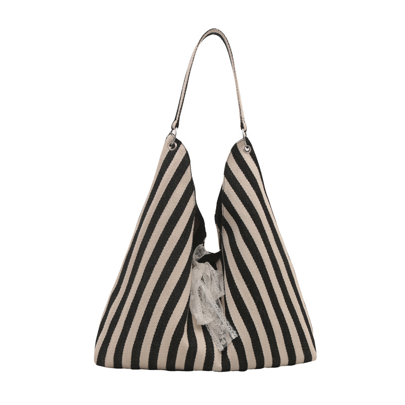Bolsa de lona a rayas para mujeres verano 2024 nueva moda nicho coreano bolso especial bolso de tela de gran capacidad para estudiantes
