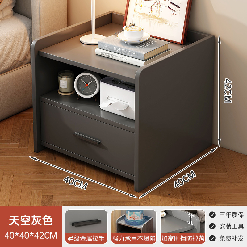 Personalizada al por mayor mesilla de cabecera moderna simple estante de cabecera del dormitorio doméstico ligero de lujo de alta calidad gabinete de almacenamiento junto a la cama