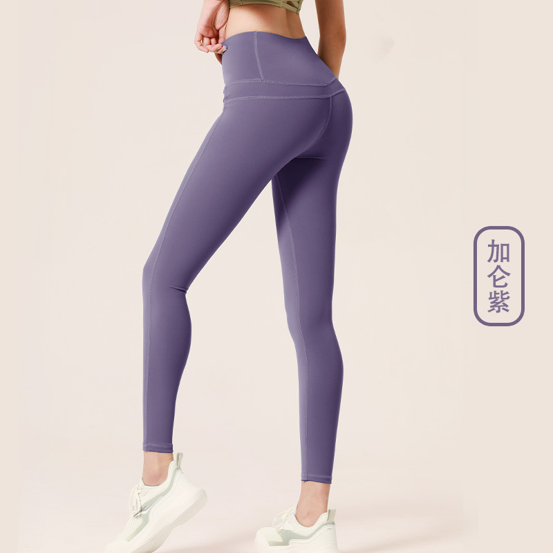 Juyitang europeo y americano desnudo melocotón verano fitness Pantalones mujer apretado cintura alta cadera elevación estiramiento correr deportes yoga Pantalones