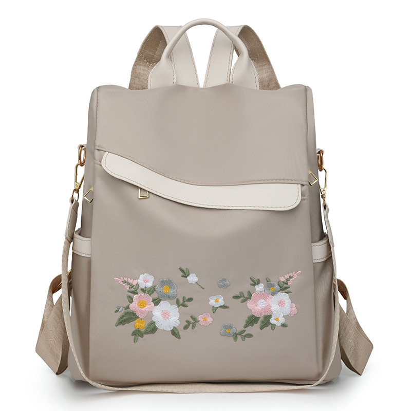 2024 nueva mochila antirrobo bordada para mujer estilo étnico moda flor ocio mochila de viaje de un solo hombro de doble uso
