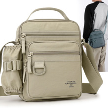 单肩包男士出差随身斜跨男包休闲时尚竖款男生实用背包工具包批发