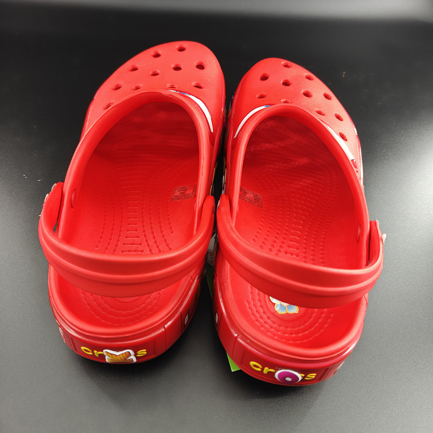 Spot 95 automóviles sin agujeros de lámpara zapatos de carreras movilización total zapatos para hombres y mujeres 2025 sandálias de playa spot al por mayor