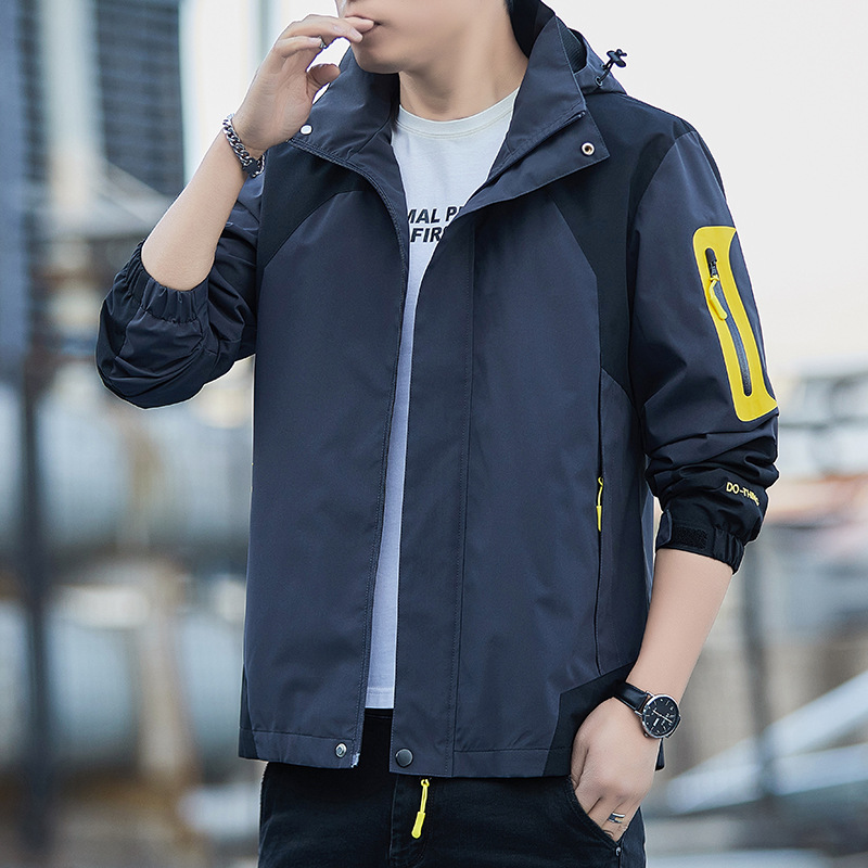 Nueva primavera y otoño chaqueta al aire libre pareja chaqueta a prueba de viento impermeable chaqueta con capucha Top montañismo ropa hombres al por mayor