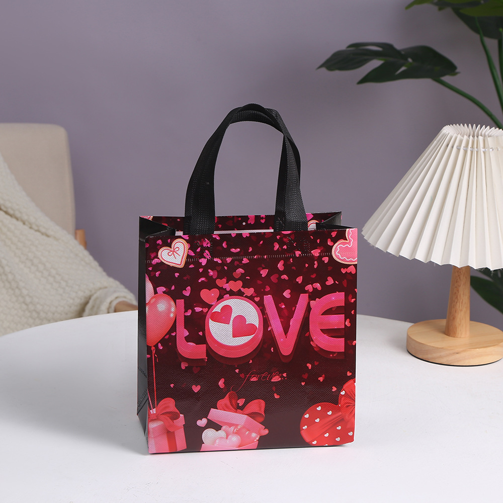 Bolsa de tela no tejida rosa con estampado de corazones para el Día de San Valentín transfronterizo, bolsa de regalo para el Día de San Valentín, bolsa de regalo para joyería.