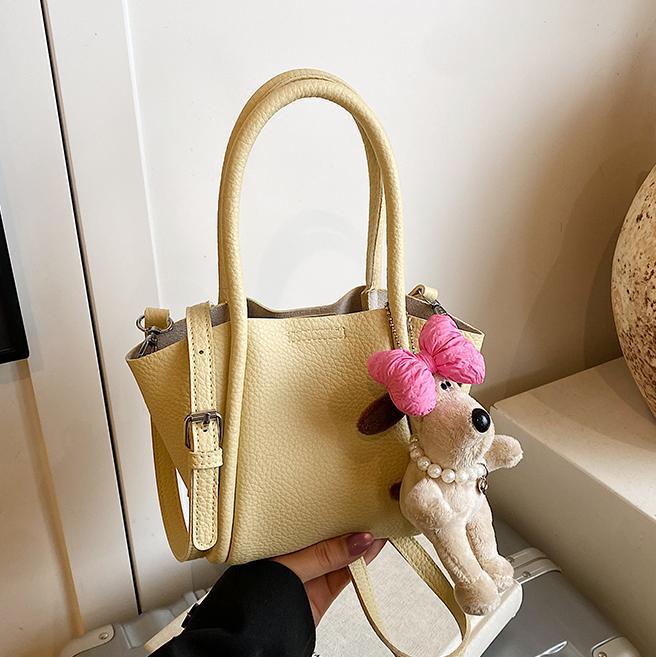 Bolso de cubo de mano de estilo explosivo transfronterizo para mujer 2025 nuevo bolso de hombro de alta gama de nicho bolso de cesta de verduras de moda coreana