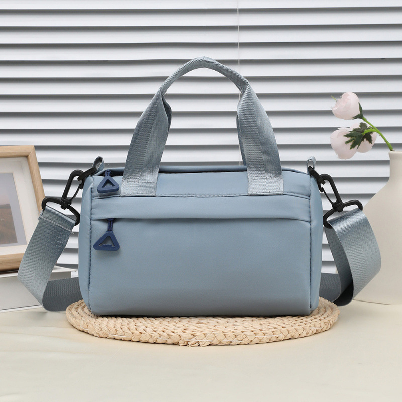 Bolso de mujer japonés simple bolso de hombro de mujer casual de gran capacidad bolso de mano deportivo versátil bolso de viento deportivo