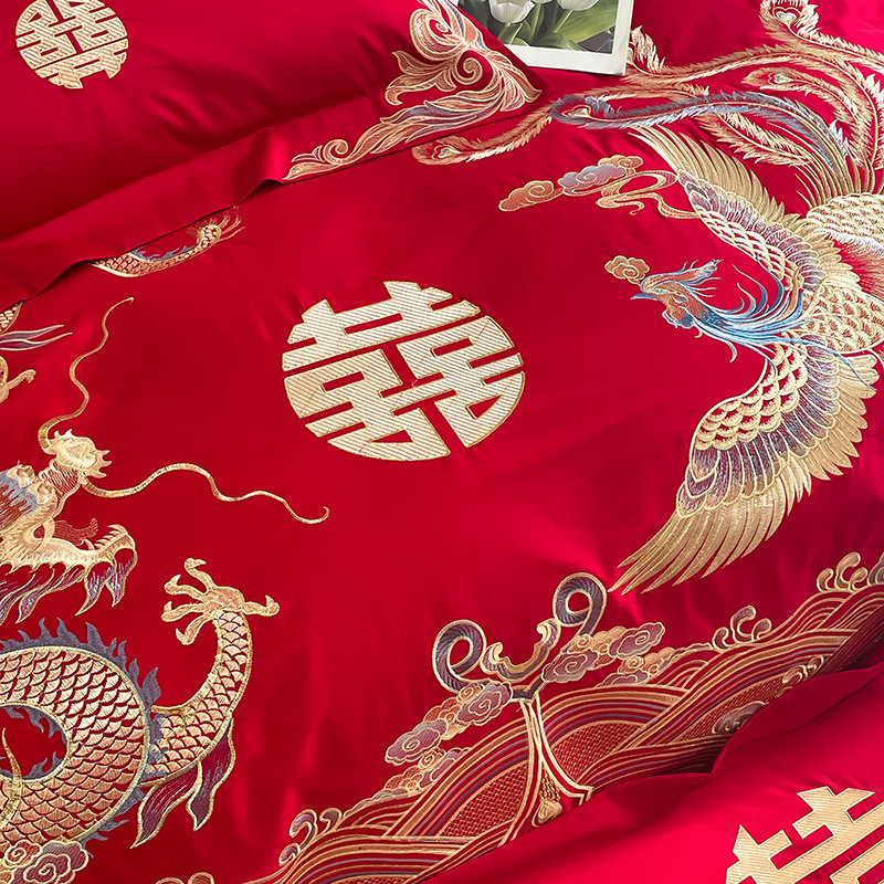 Una clase de madres y bebés de algodón de boda cuatro piezas grandes sábanas bordadas rojas chinas cubierta de cama de boda