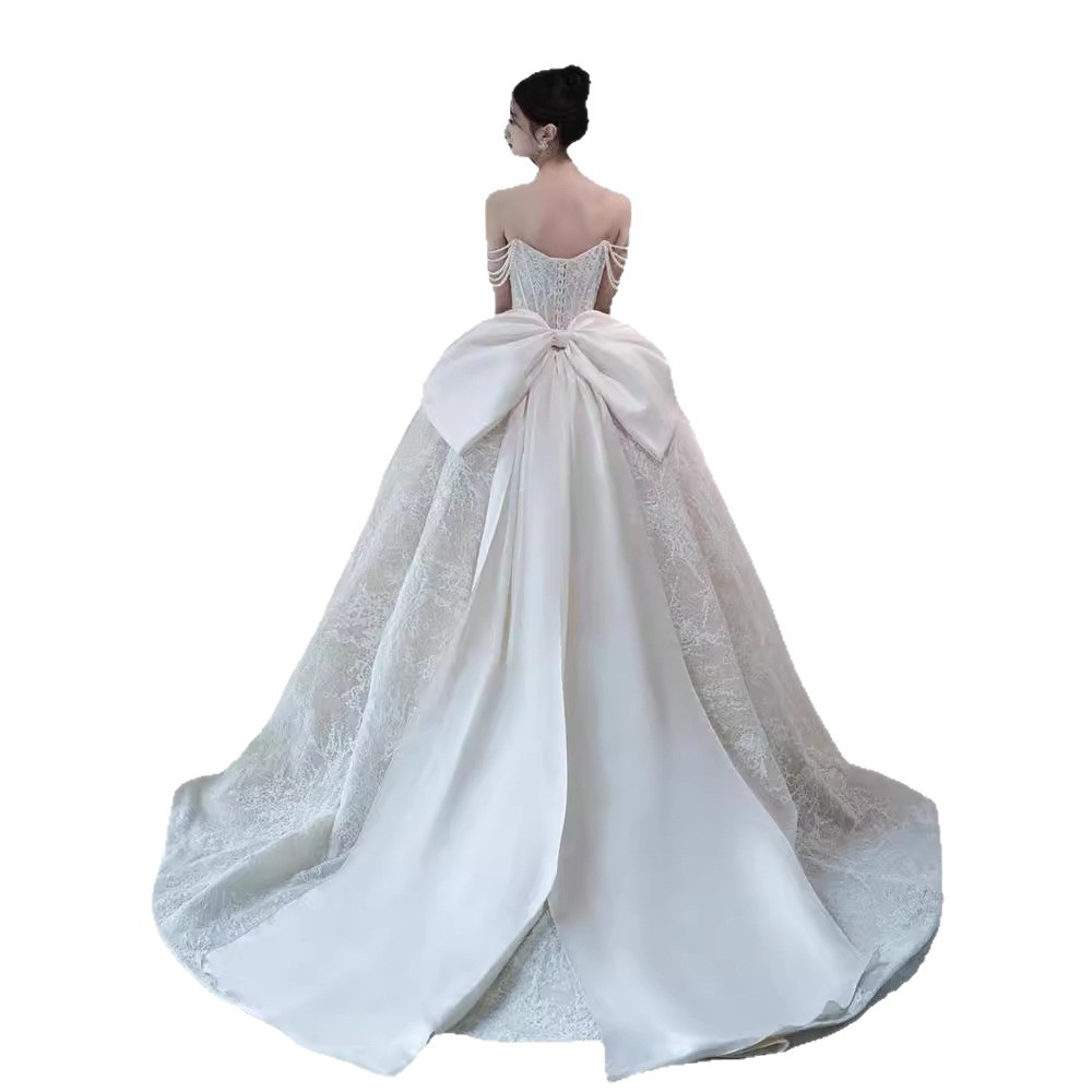 Vestido de novia sin tirantes, nuevo estilo 2026, estilo francés forestal, ligero, con textura vintage, adecuado para figuras pequeñas y de talla grande, con cola.