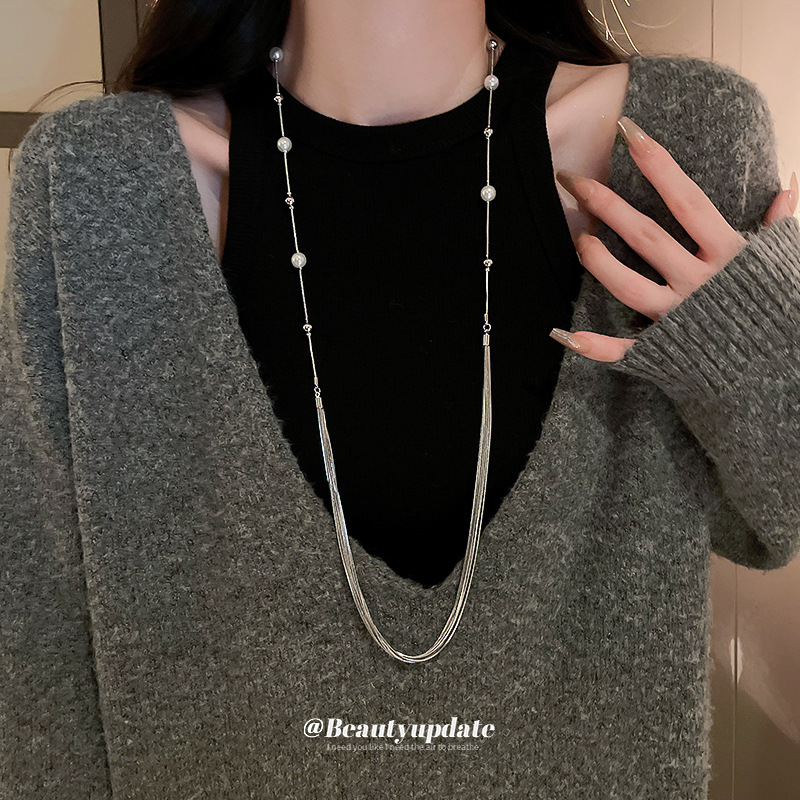 Luz de lujo largo multicapa apilados collar de perlas Otoño e Invierno versátil suéter clavícula cadena nicho de alta calidad accesorios al por mayor