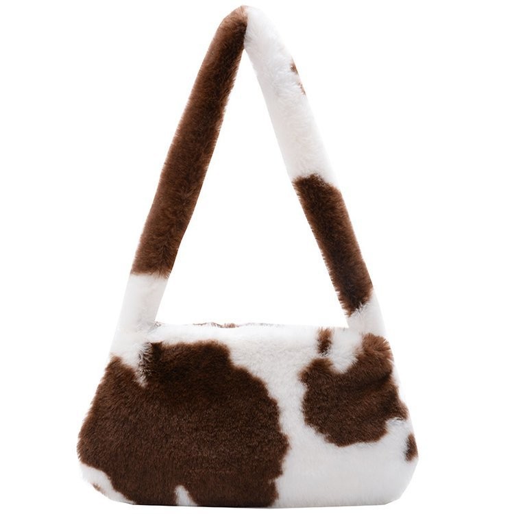 Bolsa de hombro axila 2023 nueva moda bolso de hombro portátil estilo occidental chica caliente estampado de leopardo ins bolso de las mujeres bolsa de felpa