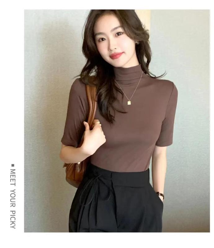 秋冬の小さい立襟の半袖のtシャツの女性の早秋の新型の韓国版は半高襟の5分の袖の純色の上着を身につけます。|undefined