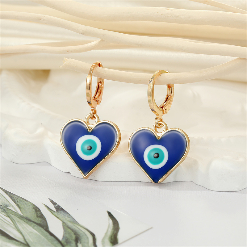 Retro Ethnic Style Color Dripping Oil Triangle Heart Eye Earrings display picture 3