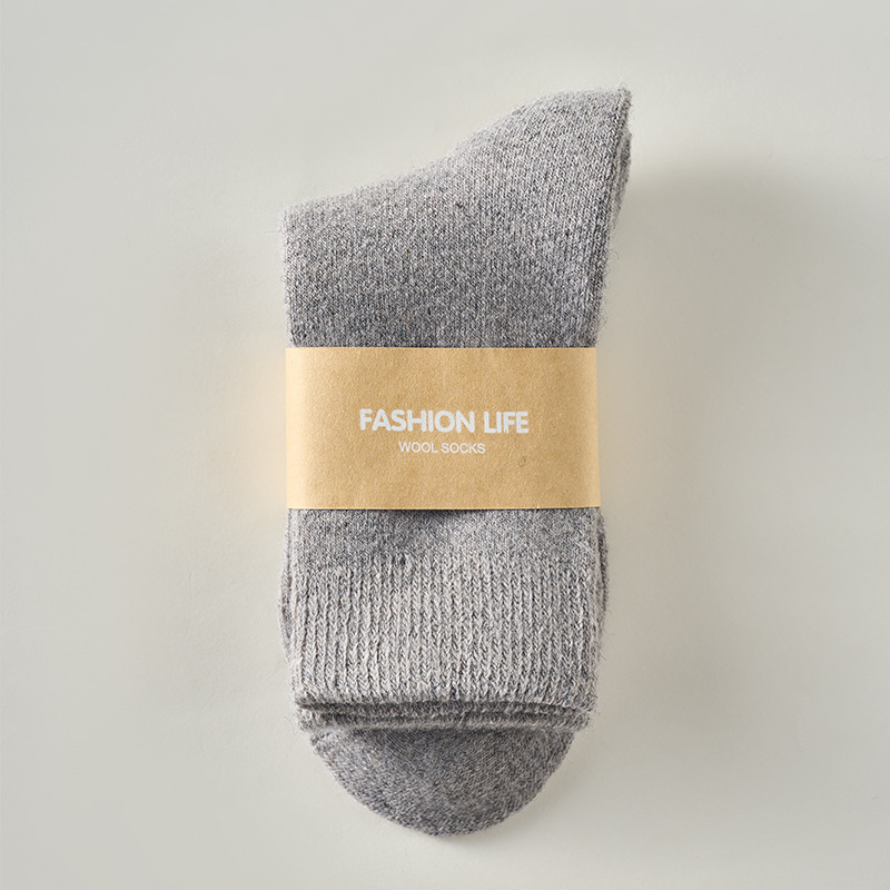 Calcetines de lana otoño e invierno más calcetines de mujer engrosados de terciopelo para hombres Calcetines cálidos de felpa de color sólido Calcetines de tubo medio para mujer de nieve
