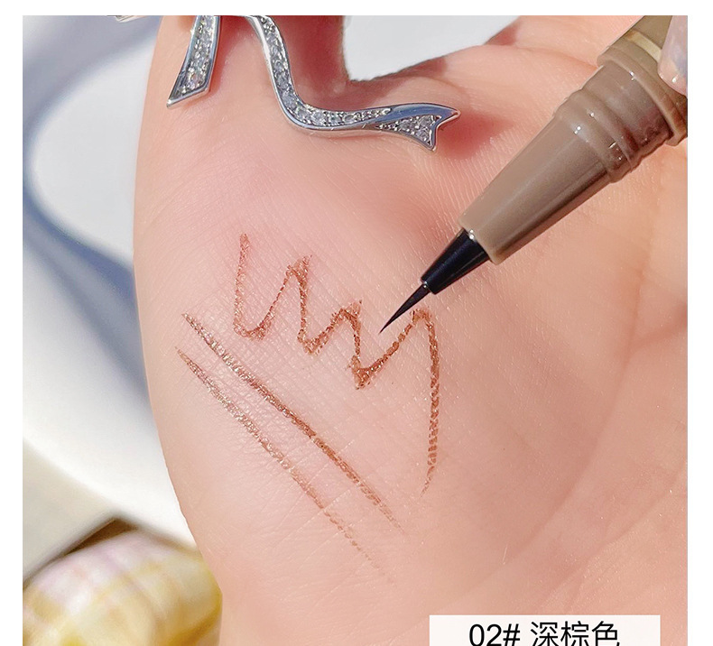 Wholesale of sweet mint Fine eyeliner Pen, waterproof, sweat-proof, long-lasting and non-staining brown liquid eyeliner pen undefined