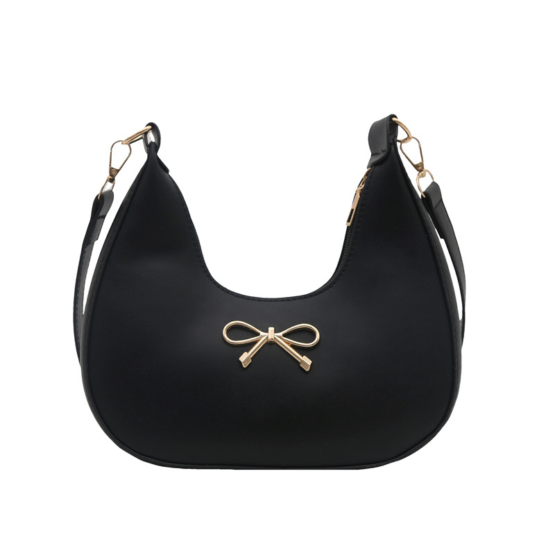 Sensación de la axila bolso pequeño mujer 2025 primavera nueva moda todo-fósforo bolso de hombro diseño de nicho bolso de palo francés mujer