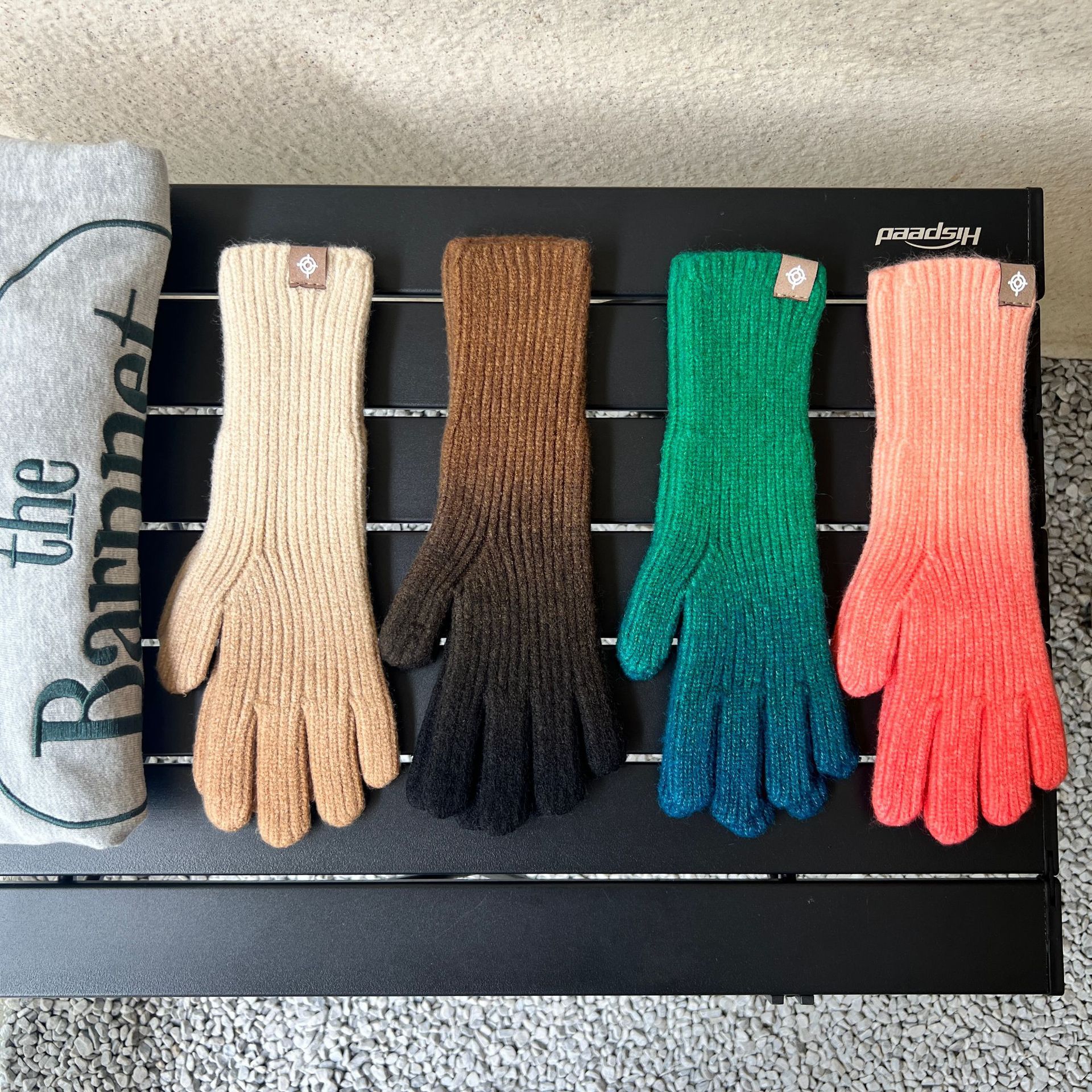 Rainbow colored woolen gloves
